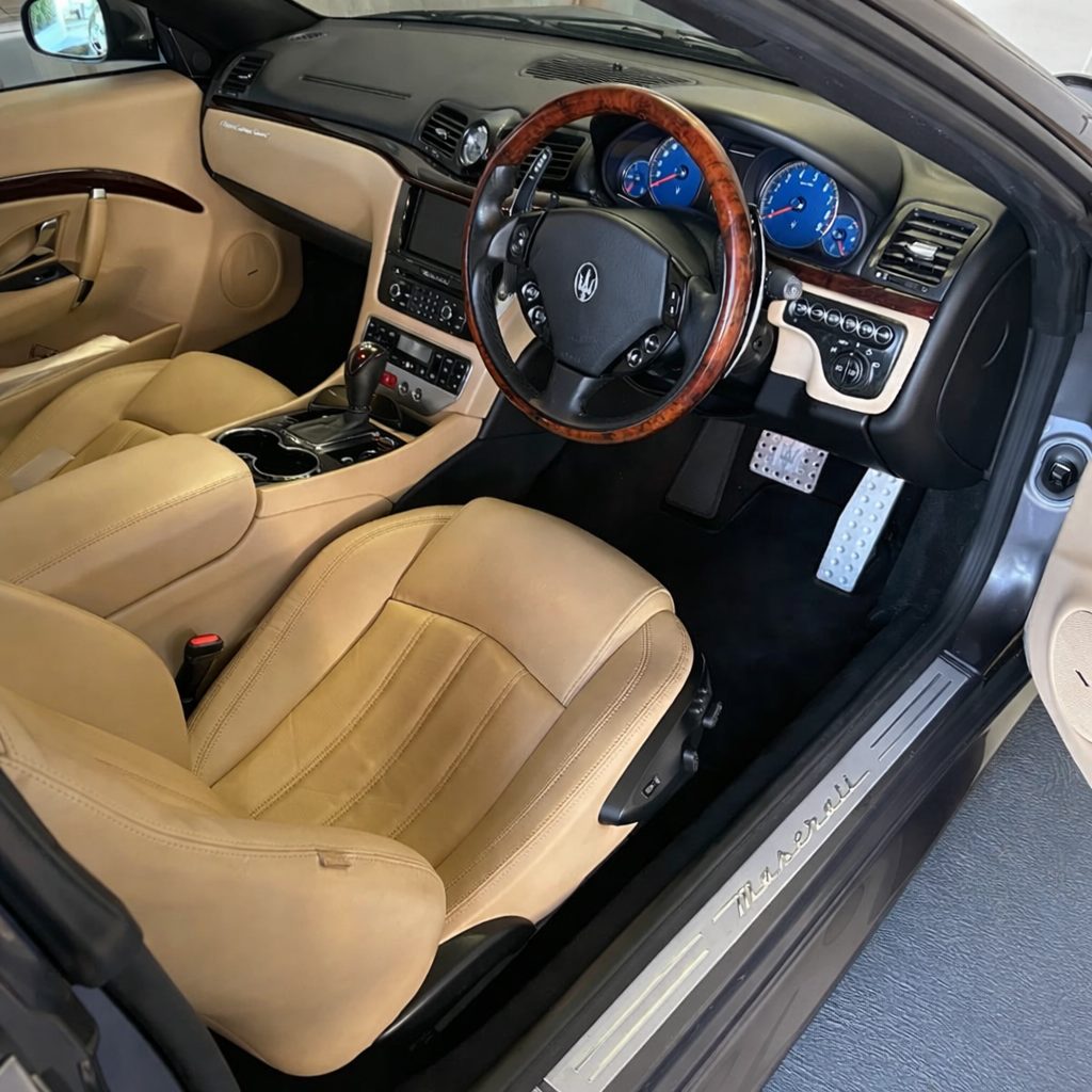 Maserati interior with beige leather seats after a detailed interior clean