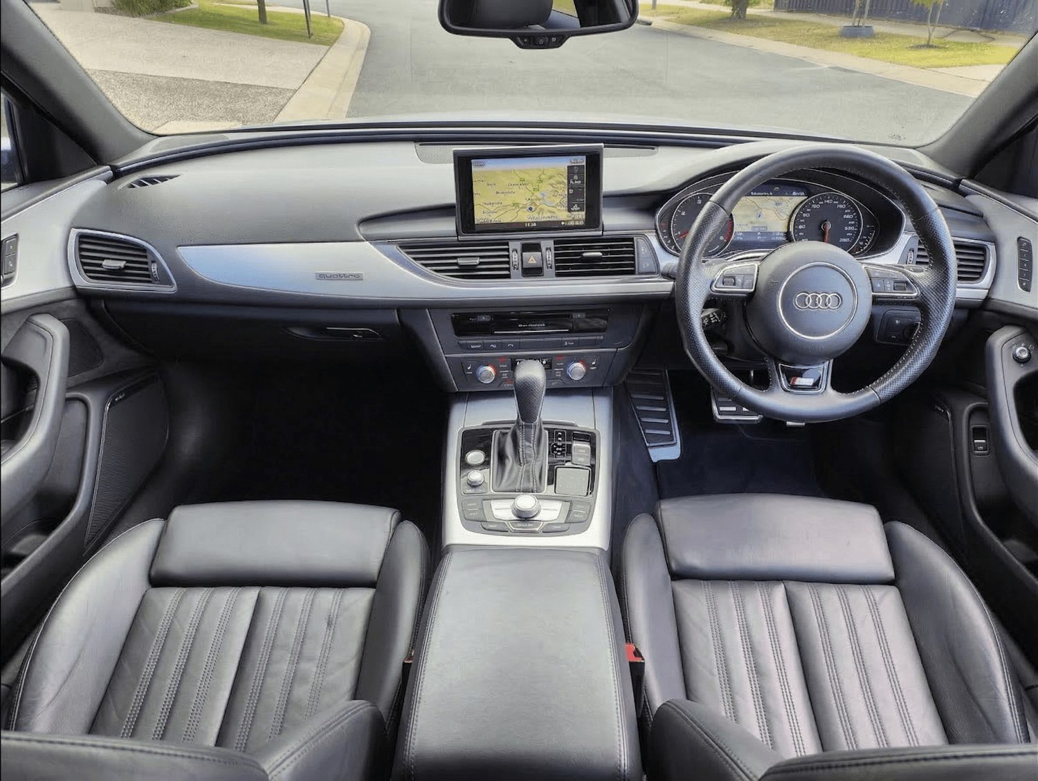 Audi dashboard, steering wheel and front seats after an interior detail